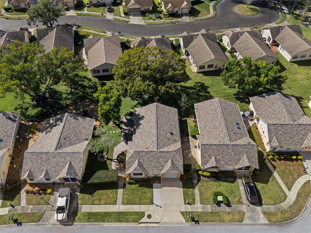 4749 Westbury Court, Unit 19 New Port Richey, FL 34655 - Photo 46 of 46 an aerial view of residential houses with outdoor space and parking