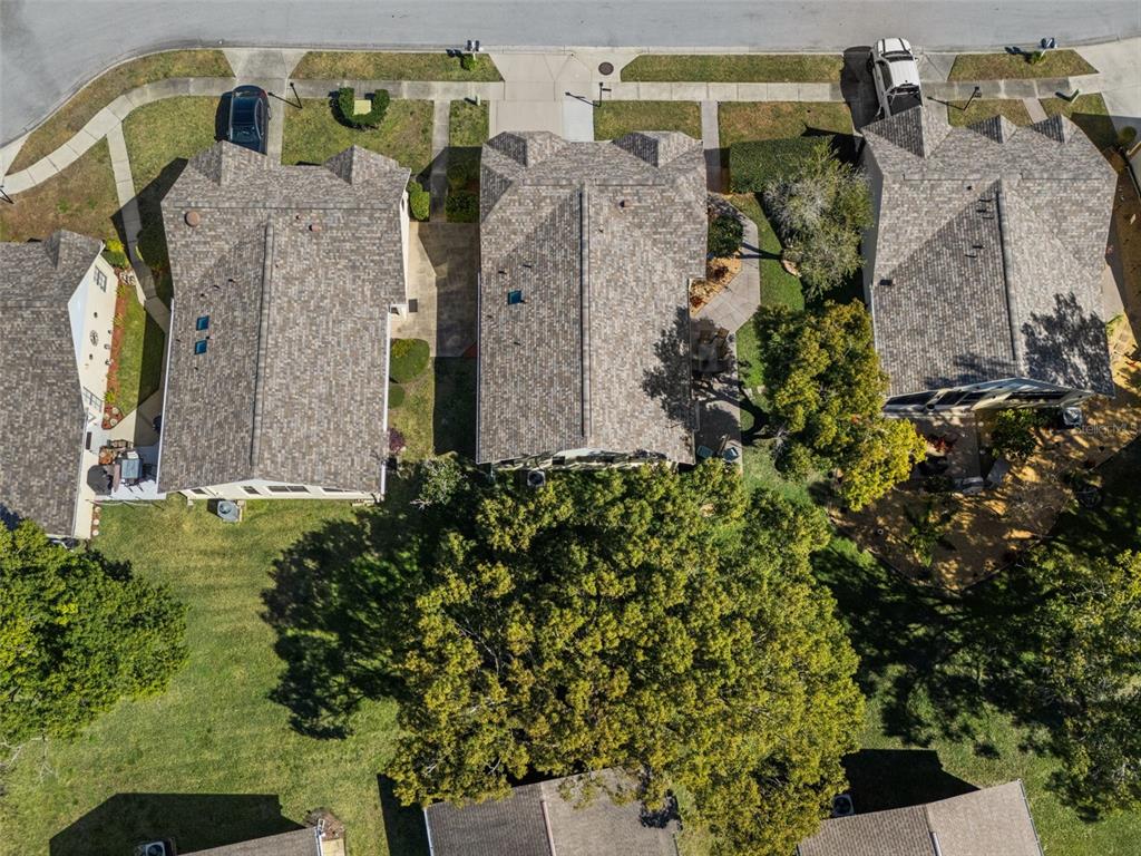 4749 Westbury Court, Unit 19 New Port Richey, FL 34655 - Photo 5 of 46 an aerial view of houses with outdoor space