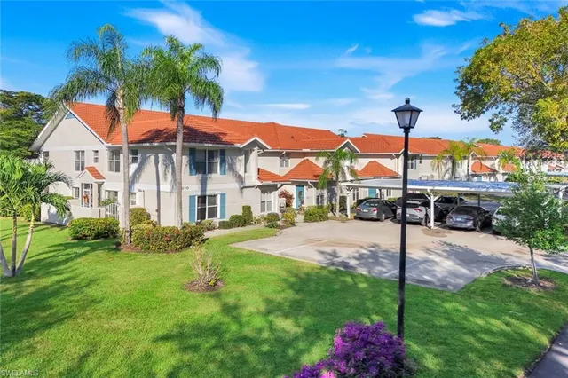 a front view of a house with yard