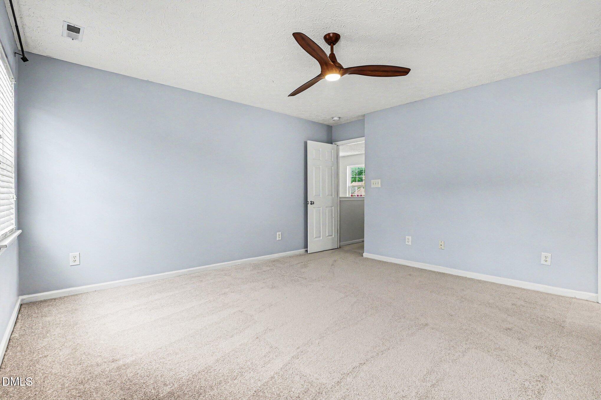 1907 Raj Drive Durham, NC 27703 - Photo 18 of 31 Primary Bedroom