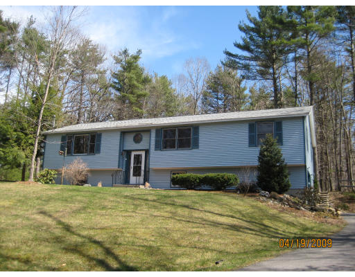 64 Wheeler Road Princeton, MA 01541 - Photo 1 of 13 a view of a yard in front of a house