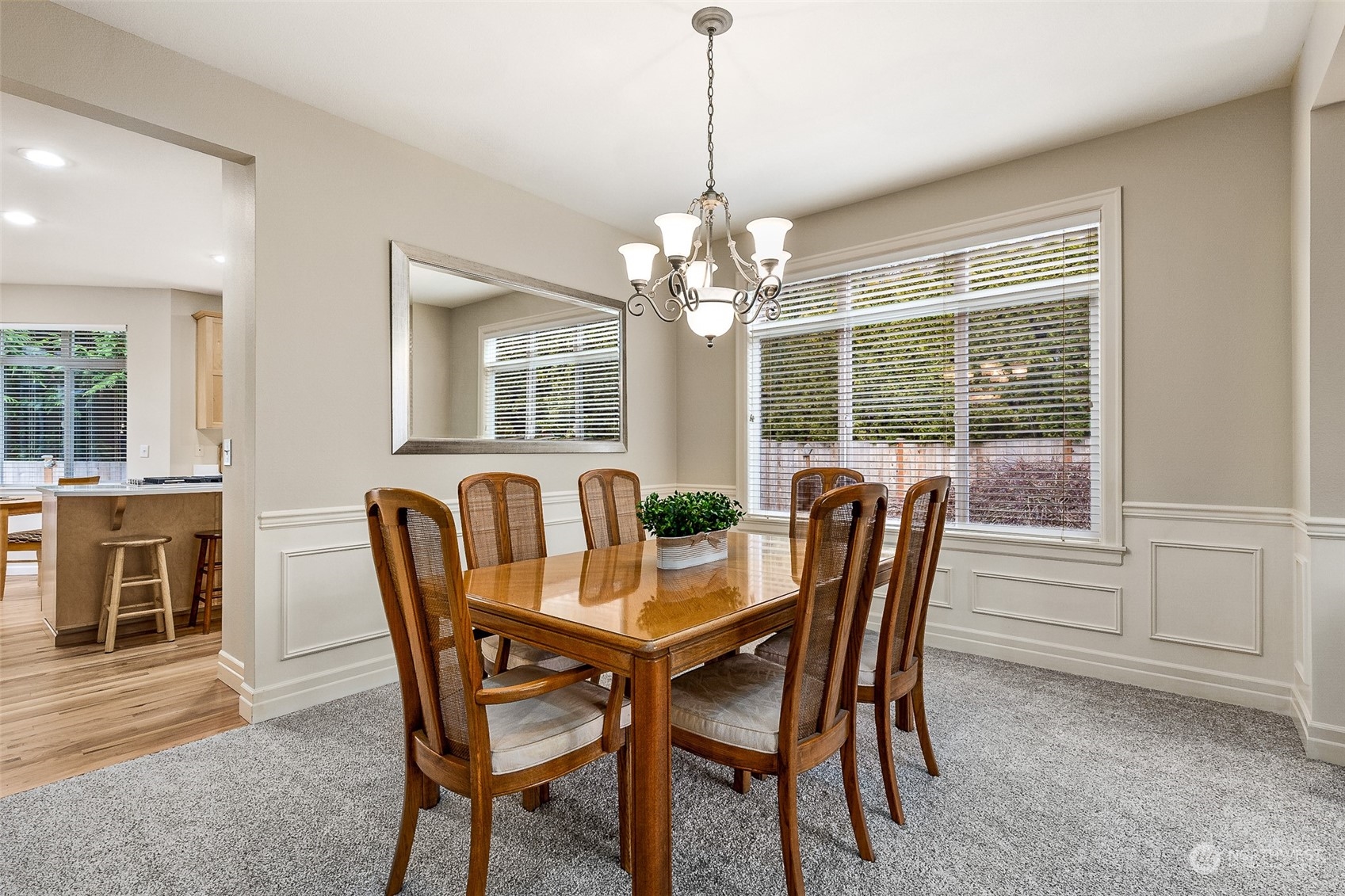 17110 16th Avenue Southeast Bothell, WA 98012 - Photo 11 of 28 a dining room with furniture a chandelier and wooden floor