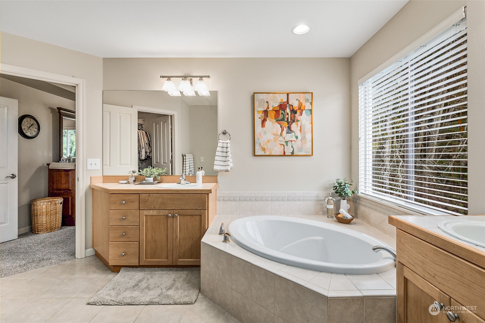 17110 16th Avenue Southeast Bothell, WA 98012 - Photo 23 of 28 a spacious bathroom with a double vanity sink tub and mirror