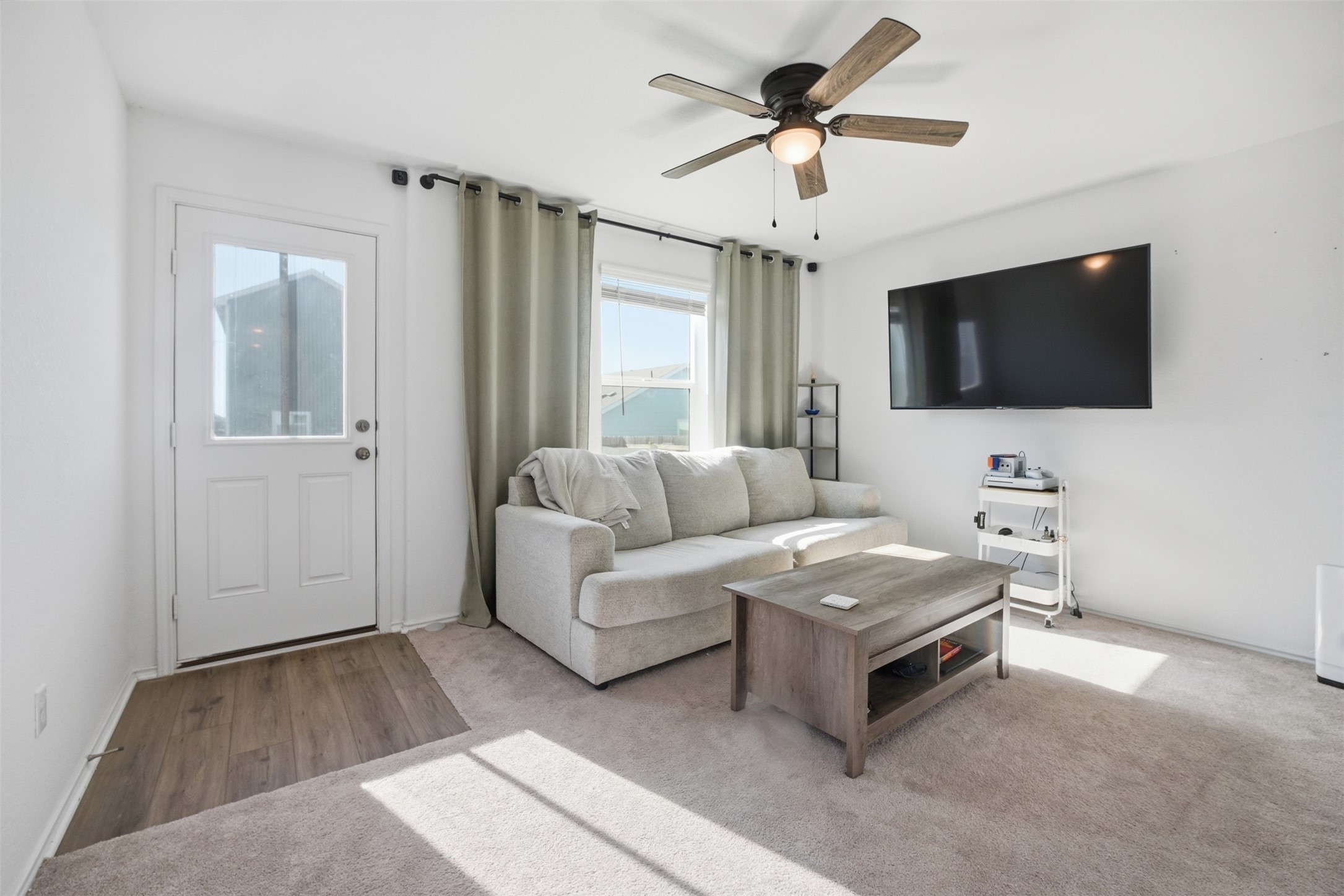 625 Marty Allen Loop Jarrell, TX 76537 - Photo 11 of 25 a living room with furniture and a flat screen tv