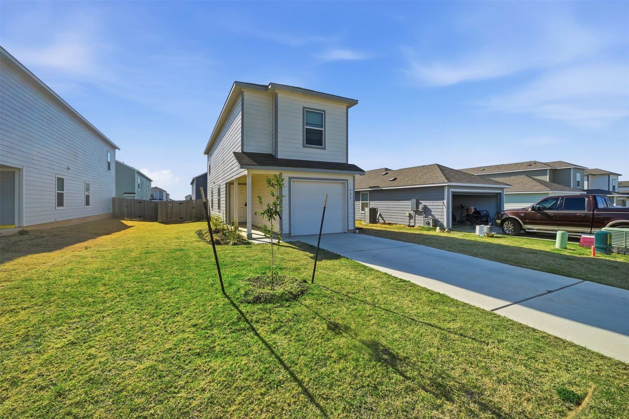 625 Marty Allen Loop Jarrell, TX 76537 - Photo 2 of 25 a house view with a garden space