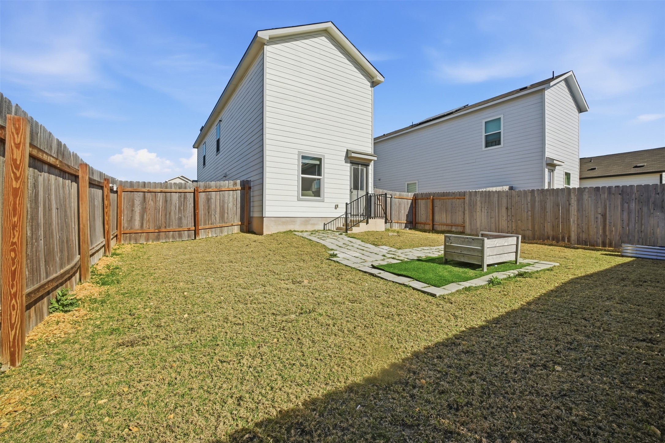 625 Marty Allen Loop Jarrell, TX 76537 - Photo 22 of 25 a house view with a backyard space