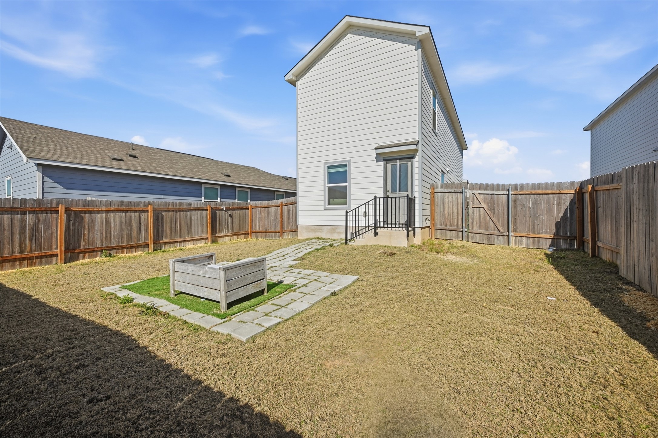 625 Marty Allen Loop Jarrell, TX 76537 - Photo 24 of 25 a front view of a house with a yard