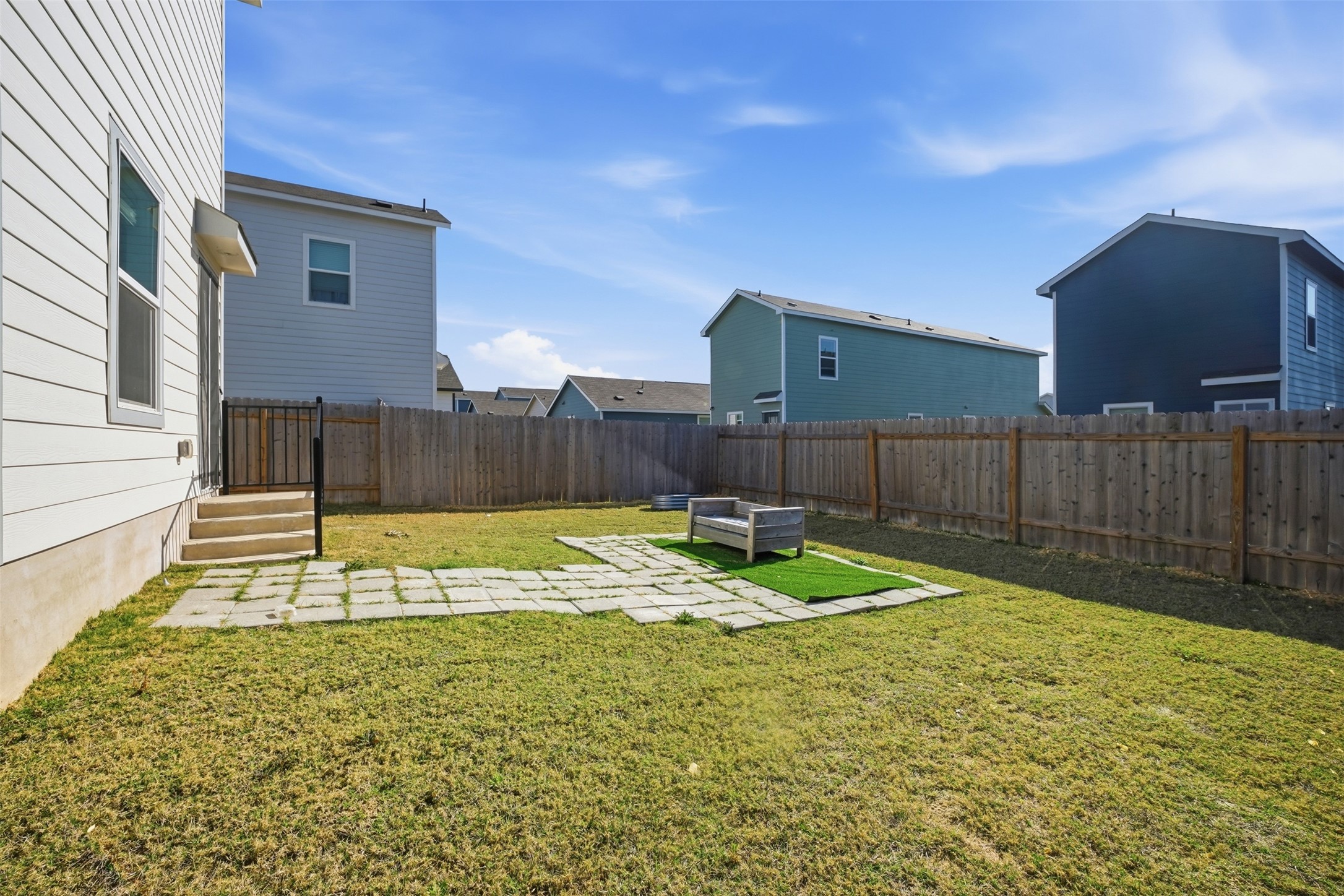 625 Marty Allen Loop Jarrell, TX 76537 - Photo 25 of 25 a view of a backyard with wooden fence
