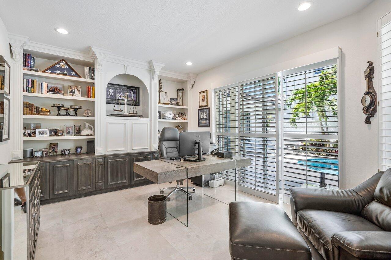 6379 Avalon Pointe Court Boca Raton, FL 33496 - Photo 12 of 37 a view of a livingroom with workspace and a window