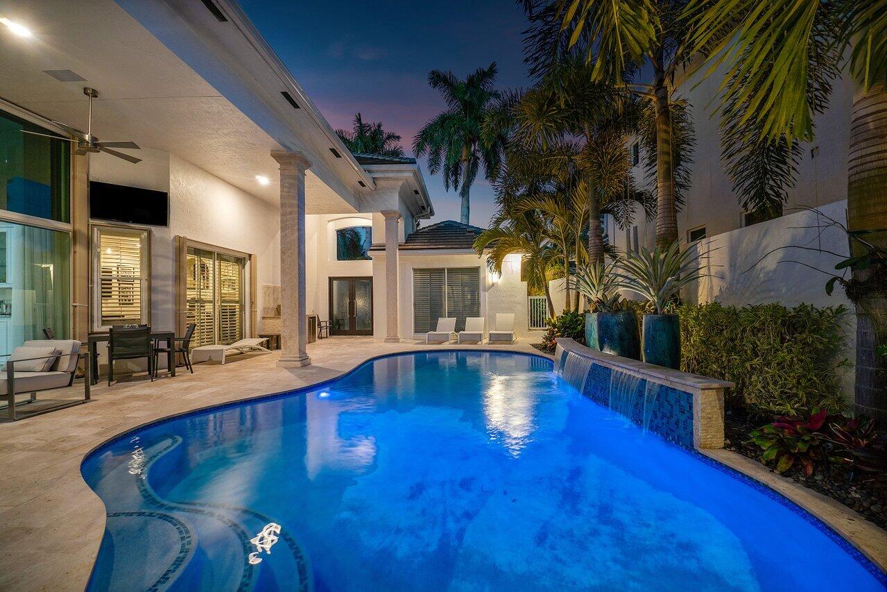 6379 Avalon Pointe Court Boca Raton, FL 33496 - Photo 25 of 37 a view of pool table and chairs in patio