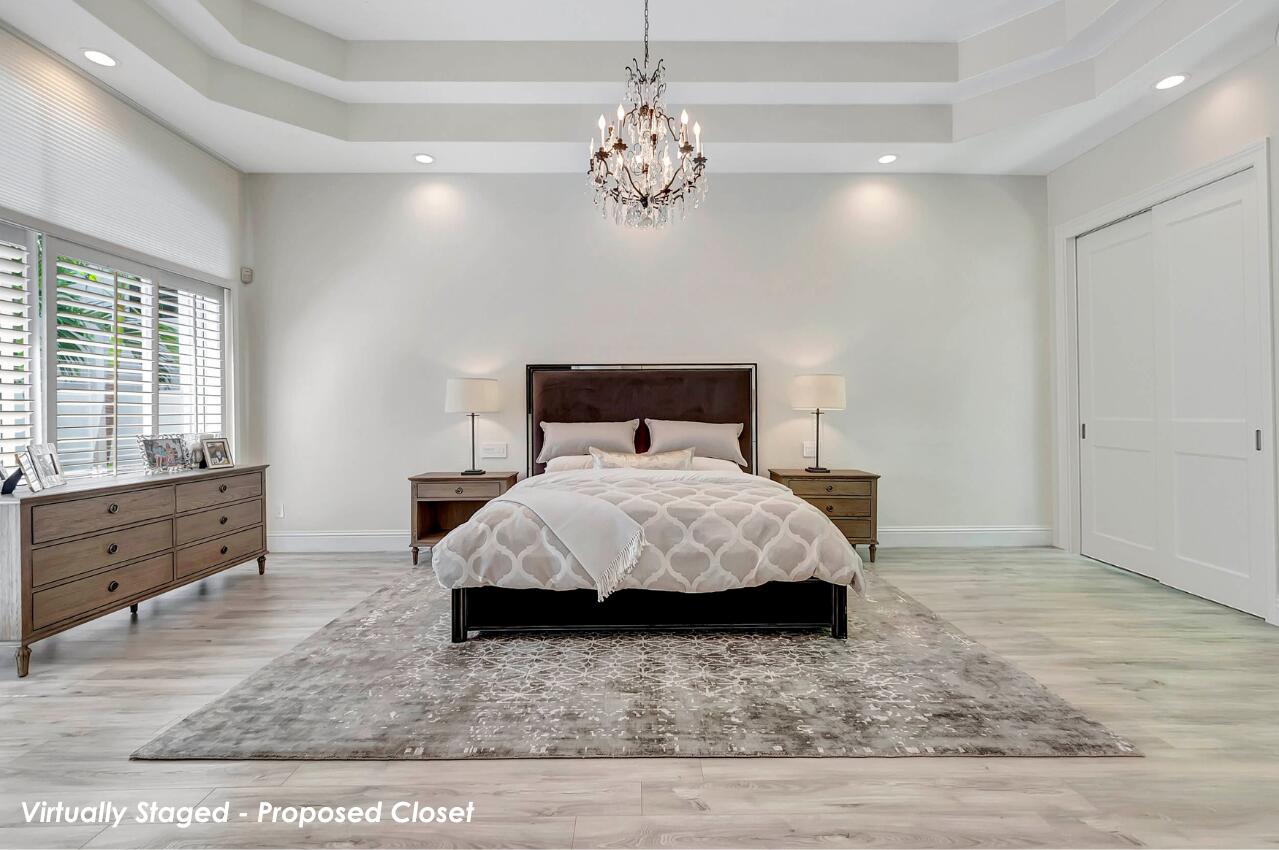 6379 Avalon Pointe Court Boca Raton, FL 33496 - Photo 7 of 37 a bedroom with a bed and a window