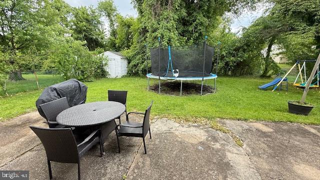 7907 Subet Road Windsor Mill, MD 21244 - Photo 29 of 31 a view of a backyard with furniture and garden