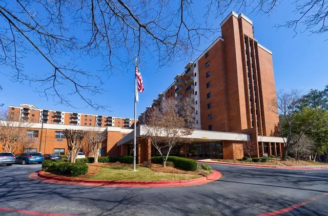 a view of tall building with street view