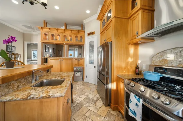 a living room with furniture gym equipment and large windows