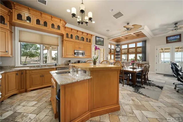 a bath tub sitting in a bathroom next to a window