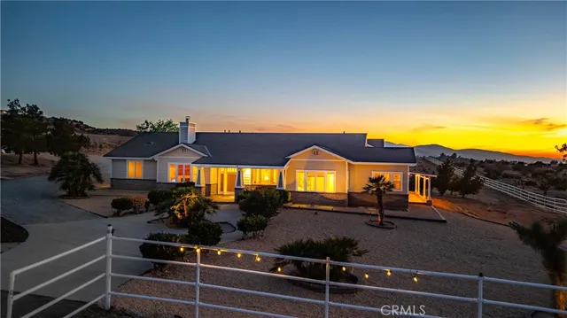 a view of multiple houses with a street