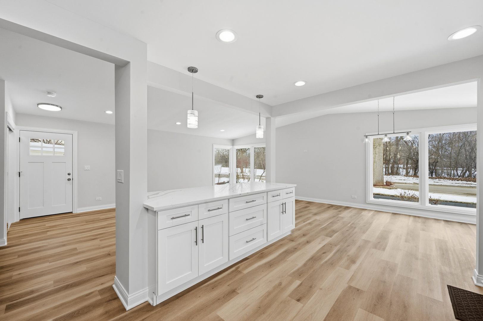 703 West Man A Wa Trail Mount Mount Prospect, IL 60056 - Photo 11 of 35 a large bathroom with a large mirror vanity and shower