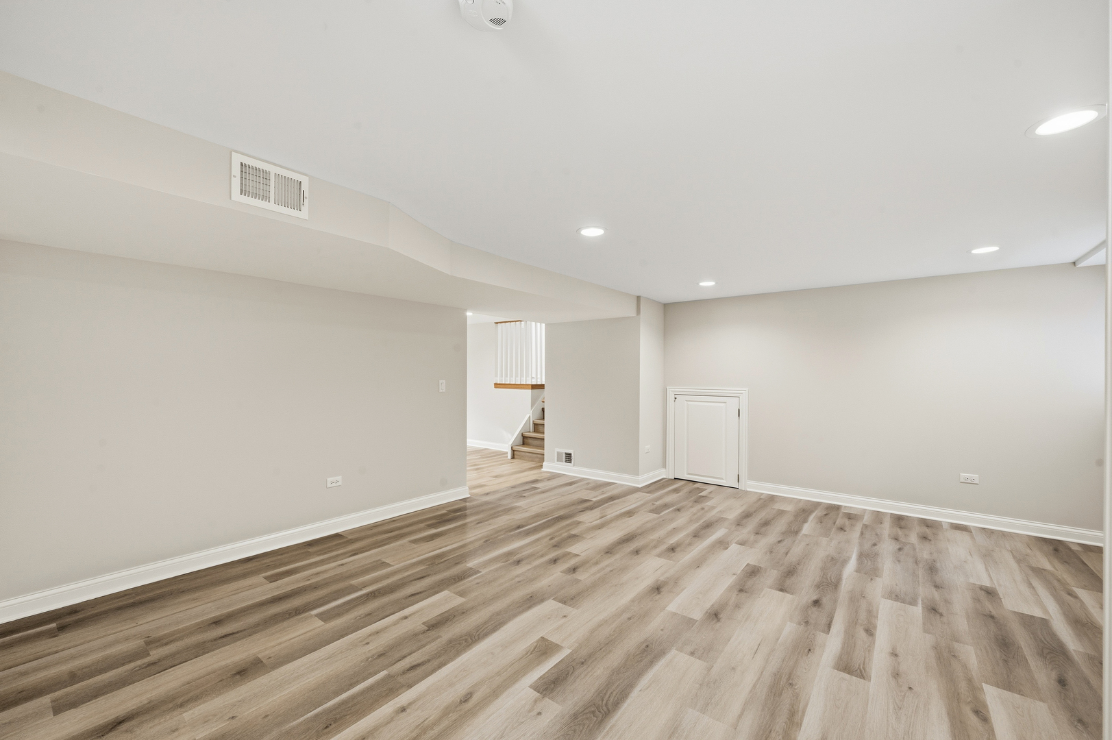703 West Man A Wa Trail Mount Mount Prospect, IL 60056 - Photo 31 of 35 a view of empty room with wooden floor