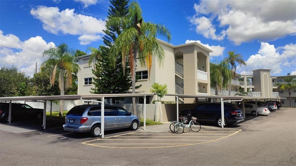 952 Virginia Street, Unit 103 Dunedin, FL 34698 - Photo 16 of 16 a view of outdoor space with porch and entertaining space
