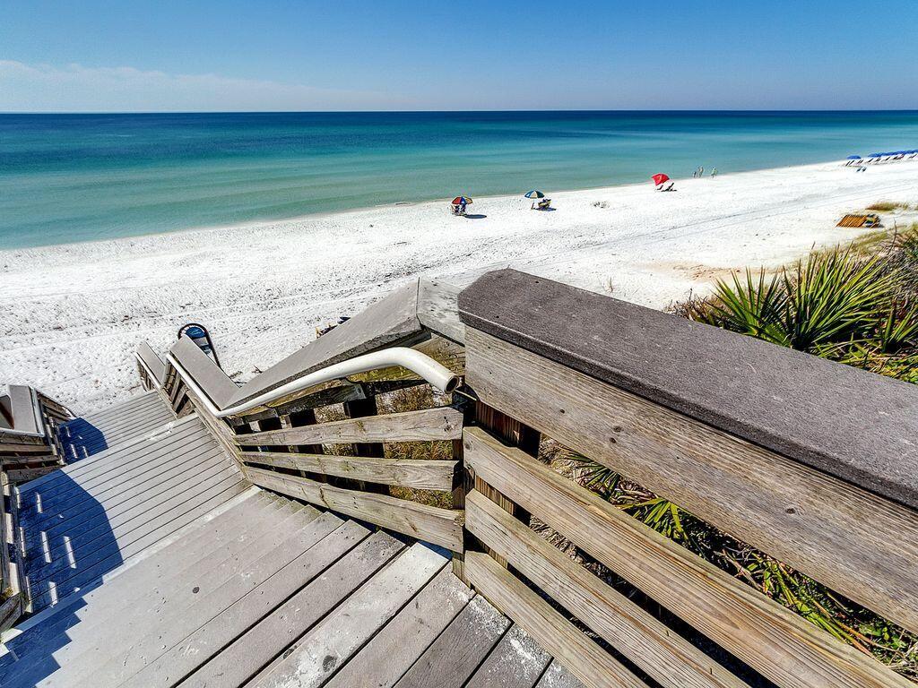 3799 East County Highway 30A, Unit H 2 Santa Rosa Beach, FL 32459 - Photo 2 of 41 a view of a balcony with two chairs