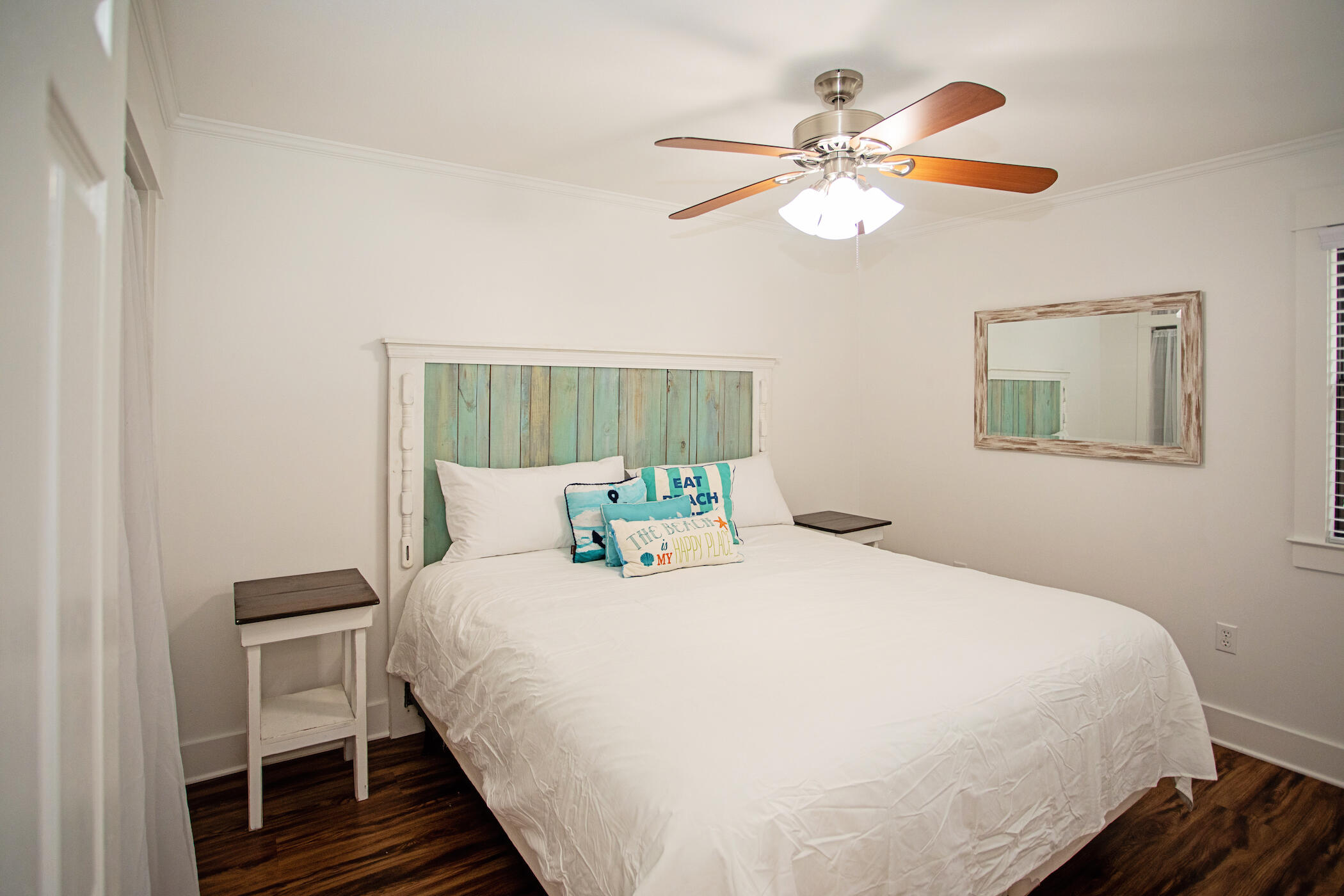3799 East County Highway 30A, Unit H 2 Santa Rosa Beach, FL 32459 - Photo 21 of 41 a bedroom with a bed and a chandelier