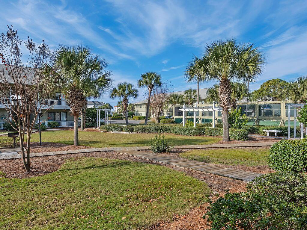 3799 East County Highway 30A, Unit H 2 Santa Rosa Beach, FL 32459 - Photo 28 of 41 a view of swimming pool with outdoor seating and green space