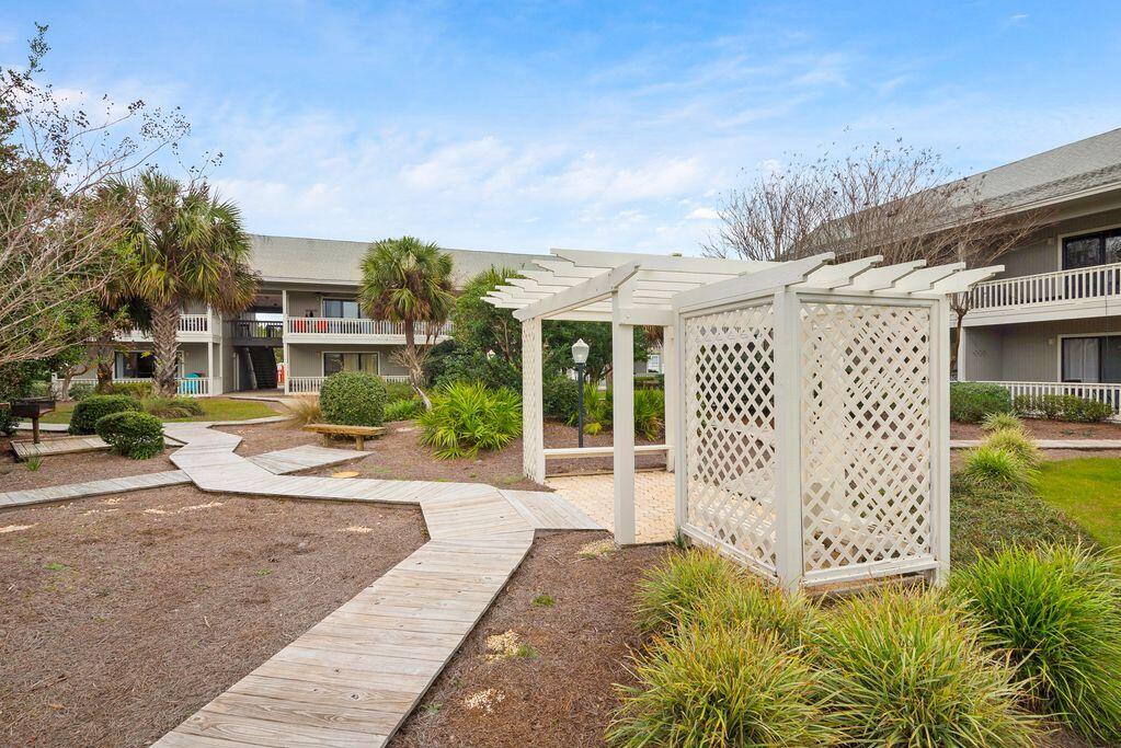3799 East County Highway 30A, Unit H 2 Santa Rosa Beach, FL 32459 - Photo 32 of 41 a view of a garden with pathway