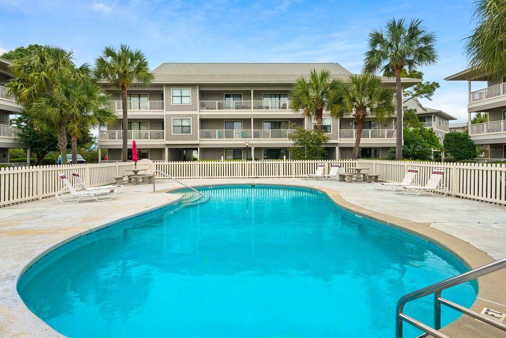 3799 East County Highway 30A, Unit H 2 Santa Rosa Beach, FL 32459 - Photo 39 of 41 a swimming pool view with a outdoor seating