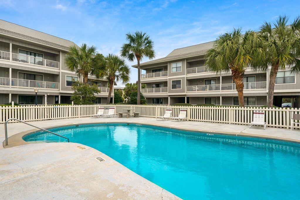3799 East County Highway 30A, Unit H 2 Santa Rosa Beach, FL 32459 - Photo 40 of 41 a view of a house with a swimming pool