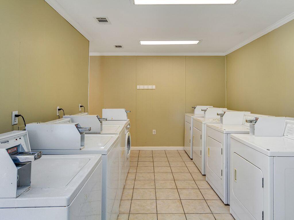 3799 East County Highway 30A, Unit H 2 Santa Rosa Beach, FL 32459 - Photo 41 of 41 a utility room with dryer and washer