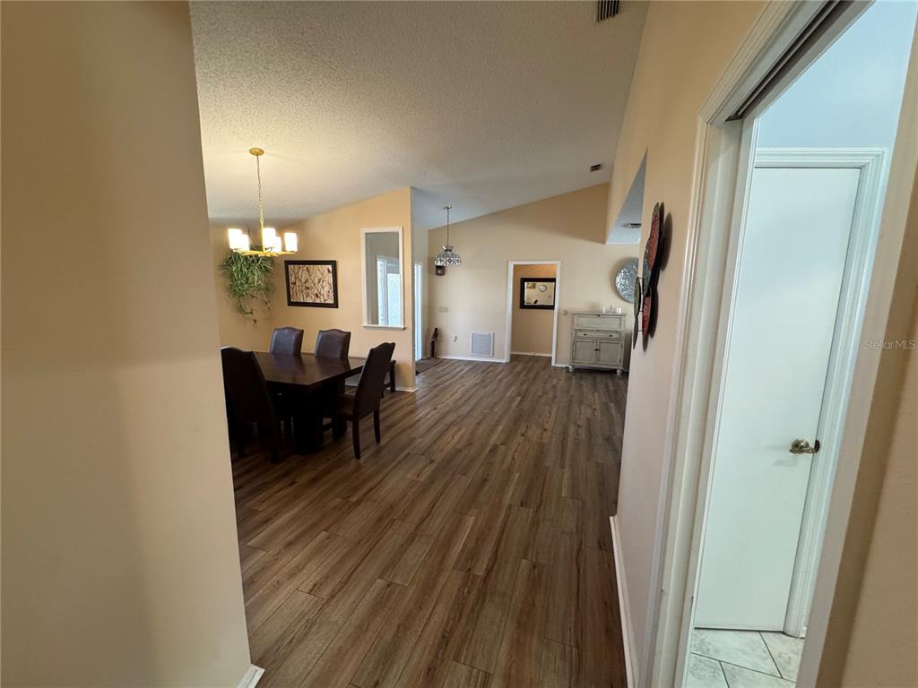 549 Warwick Lane Venice, FL 34293 - Photo 11 of 38 a view of a living room and dining room