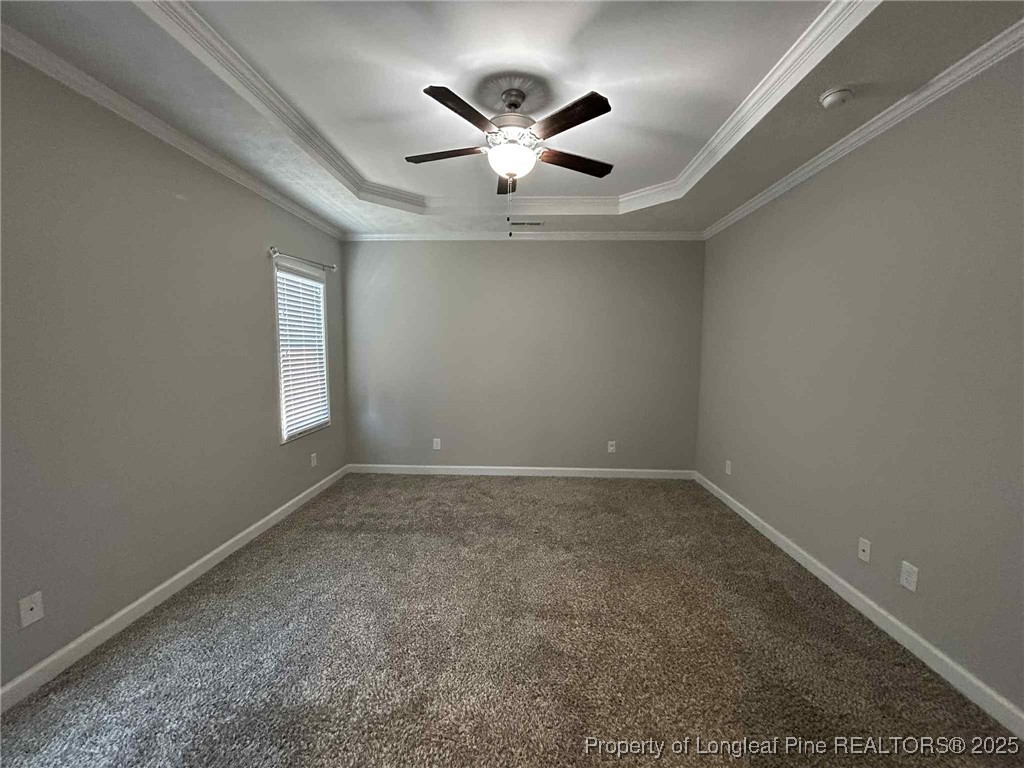 2406 Bankswood (lot 145) Court Hope Mills, NC 28348 - Photo 14 of 25 an empty room with chandelier fan and windows