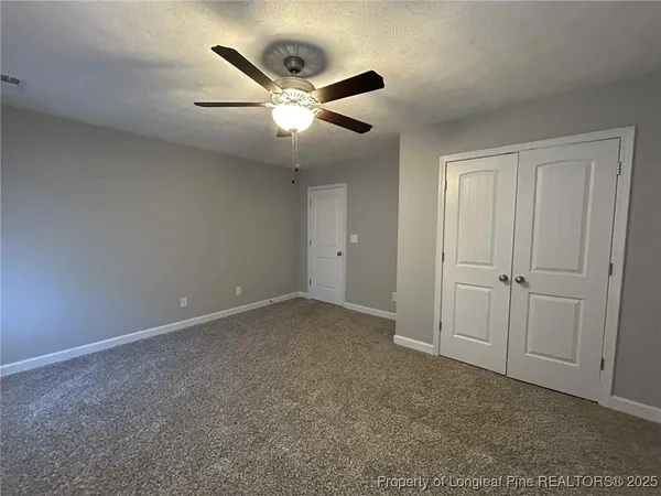 an empty room with closet