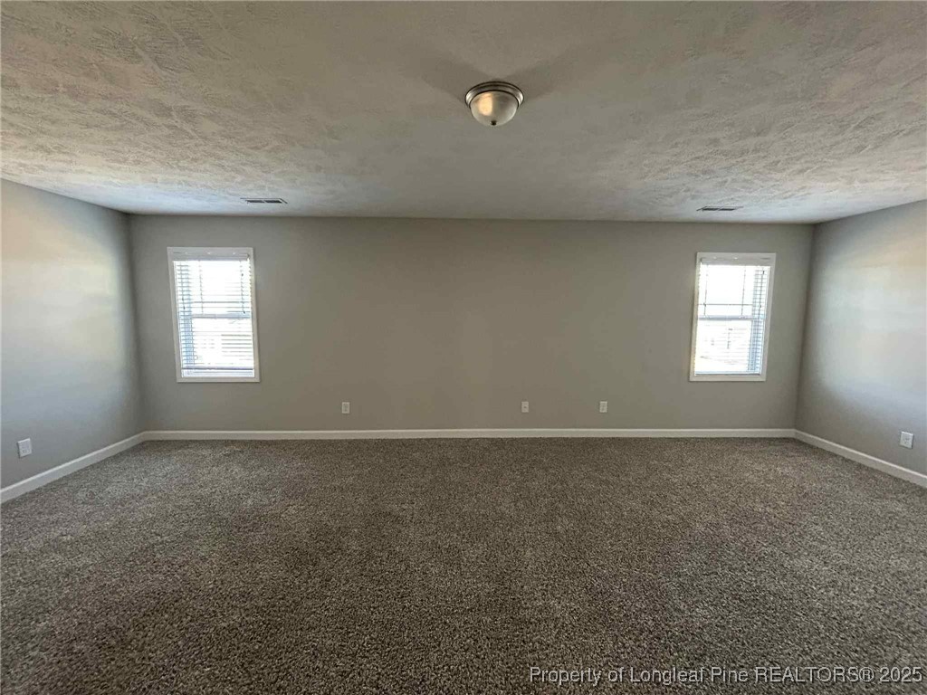 2406 Bankswood (lot 145) Court Hope Mills, NC 28348 - Photo 20 of 25 an empty room that has a window