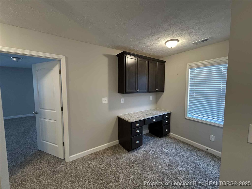 2406 Bankswood (lot 145) Court Hope Mills, NC 28348 - Photo 22 of 25 a view of an empty room with kitchen and window