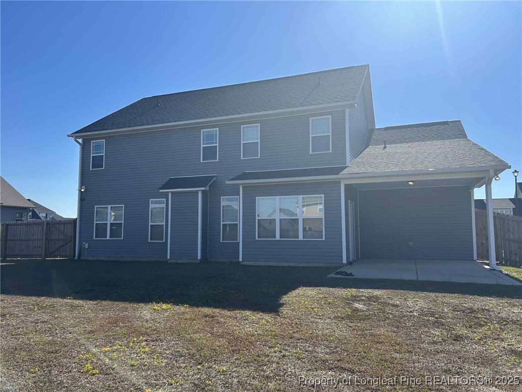 2406 Bankswood (lot 145) Court Hope Mills, NC 28348 - Photo 25 of 25 a front view of a house with a yard