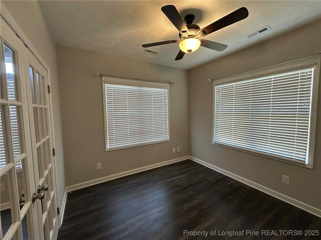 2406 Bankswood (lot 145) Court Hope Mills, NC 28348 - Photo 5 of 25 a view of an empty room with wooden floor and a window