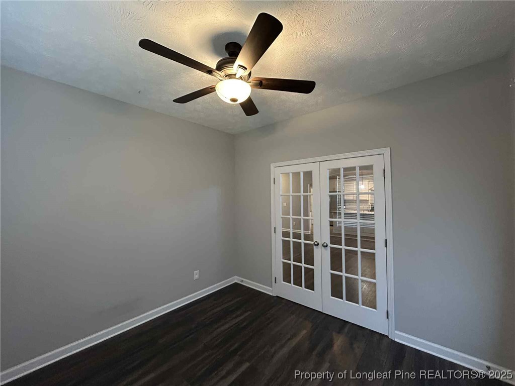 2406 Bankswood (lot 145) Court Hope Mills, NC 28348 - Photo 6 of 25 a view of an empty room with wooden floor and a window