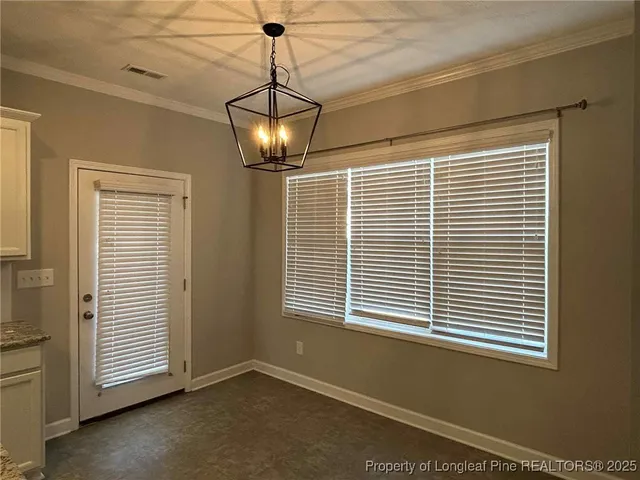 a view of a livingroom with a chandelier