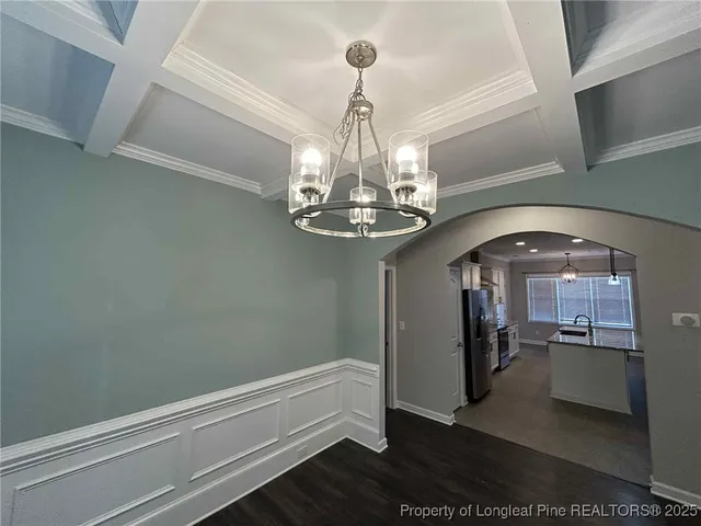 a view of a room with a chandelier