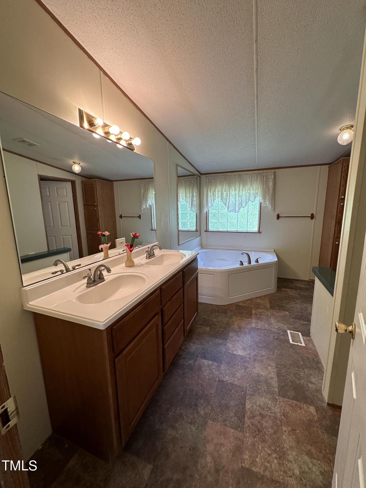 291 Pixley Pritchard Road Timberlake, NC 27583 - Photo 21 of 38 primary bathroom