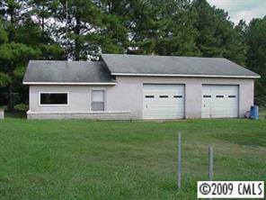 402 Kiser Road Bessemer City, NC 28016 - Photo 2 of 5 a view of a house with a yard