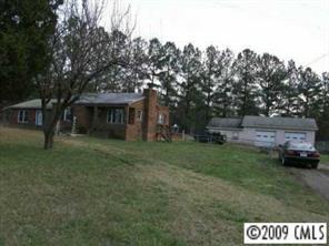 402 Kiser Road Bessemer City, NC 28016 - Photo 3 of 5 a view of house with outdoor space