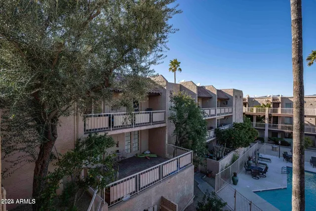 a front view of a building with street view