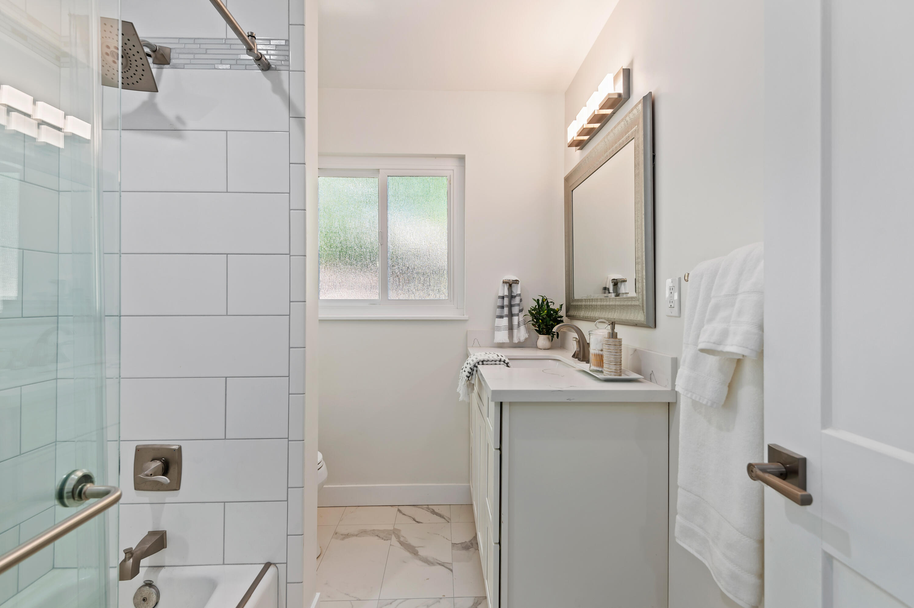 55 Crestview Lane Santa Barbara, CA 93108 - Photo 14 of 28 a bathroom with a sink a toilet and shower