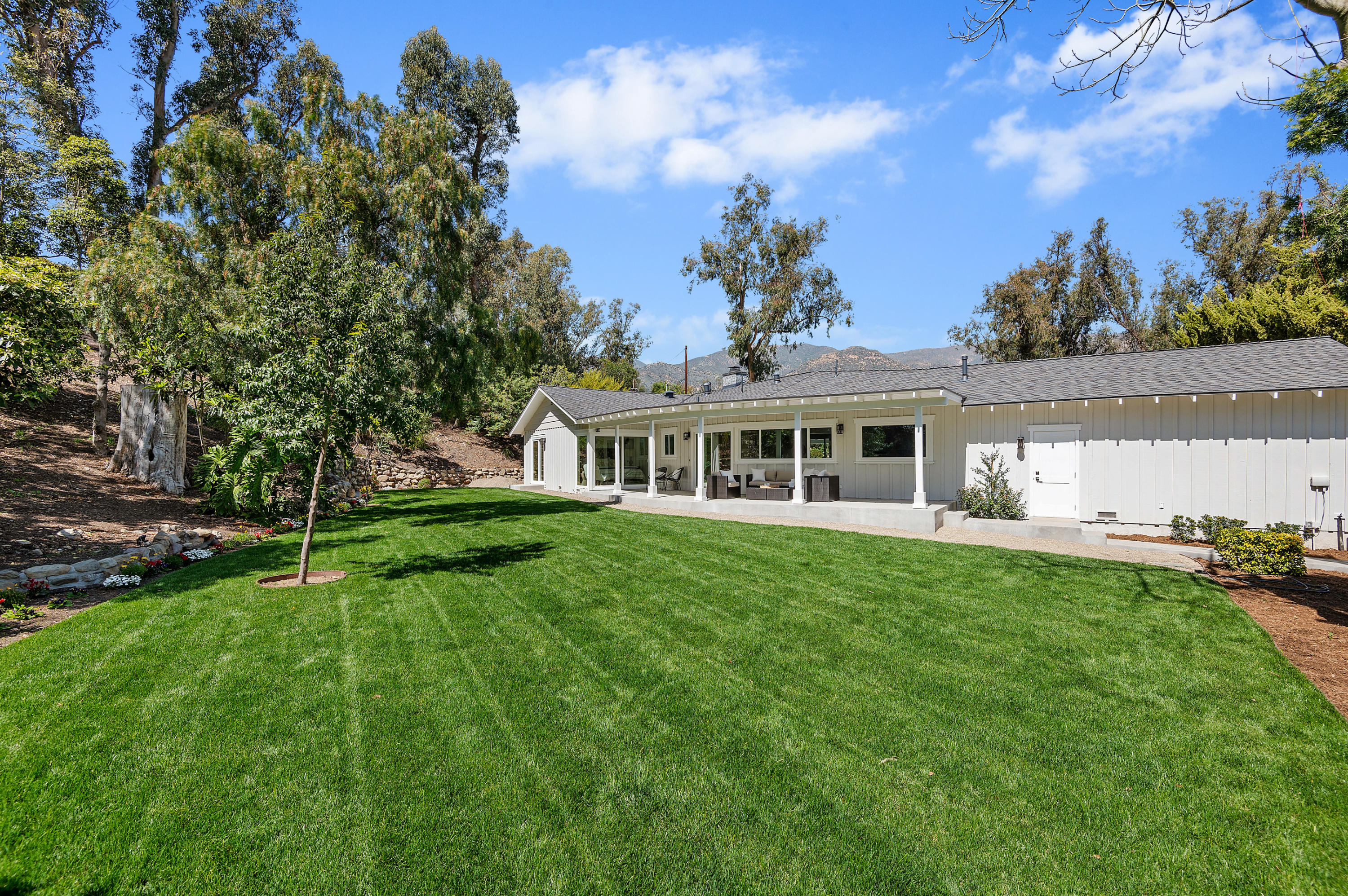 55 Crestview Lane Santa Barbara, CA 93108 - Photo 18 of 28 a front view of a house with a garden