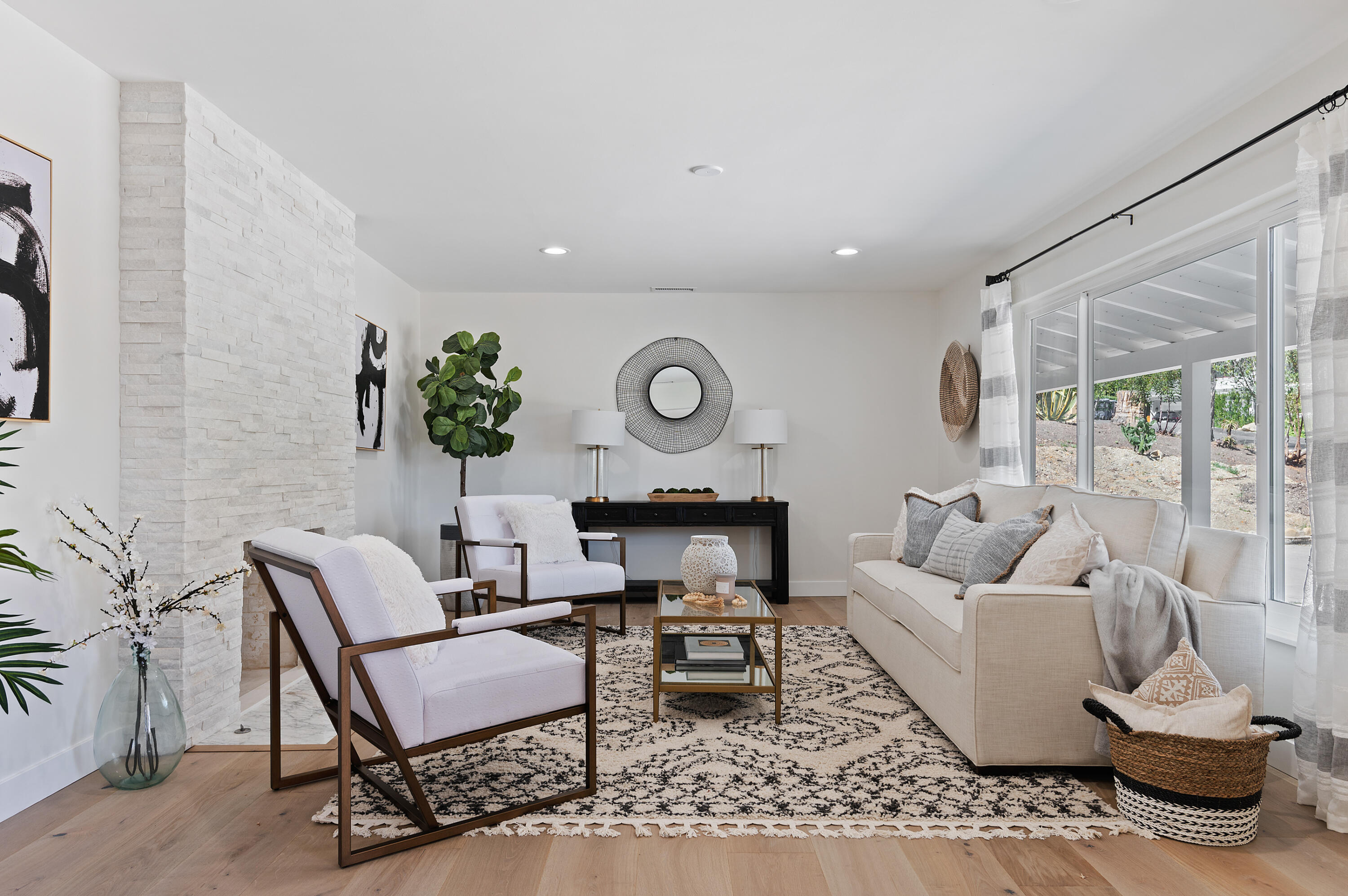 55 Crestview Lane Santa Barbara, CA 93108 - Photo 3 of 28 a living room with furniture and a wooden floor