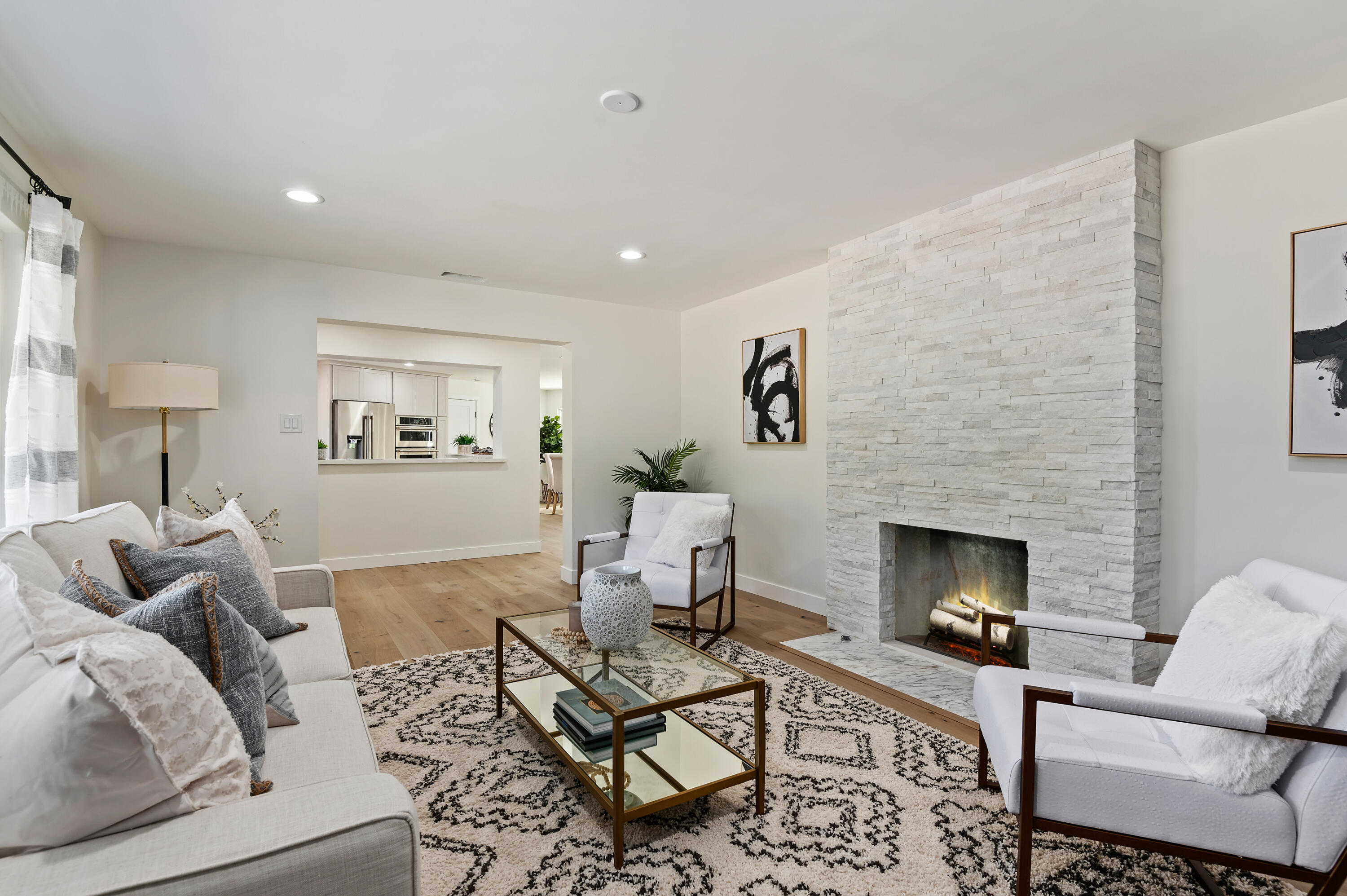 55 Crestview Lane Santa Barbara, CA 93108 - Photo 4 of 28 a living room with furniture and a fireplace