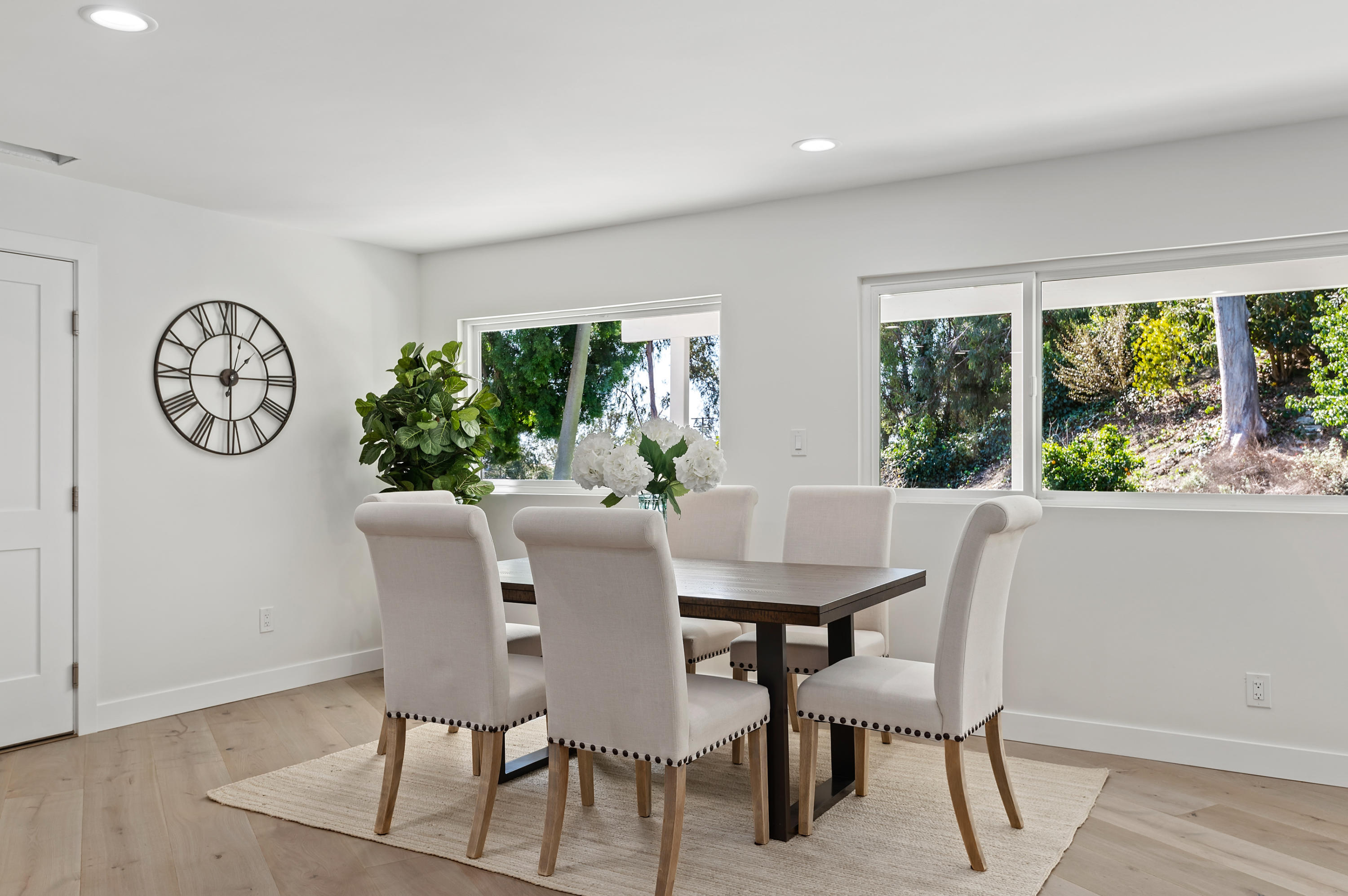 55 Crestview Lane Santa Barbara, CA 93108 - Photo 9 of 28 a view of a dining room with furniture window and wooden floor