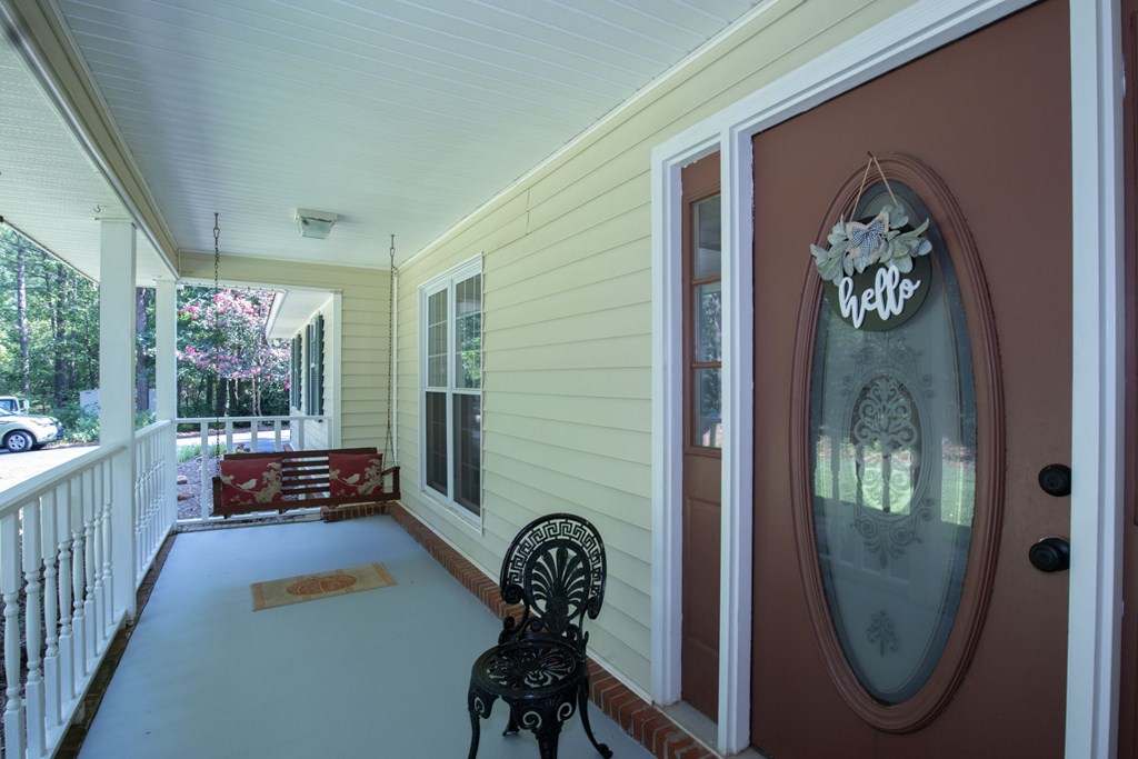 11318 Warm Springs Road Midland, GA 31820 - Photo 3 of 32 FRONT PORCH W/SWING